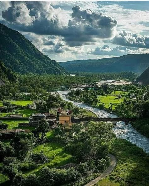 Yatris posing together near the helipad